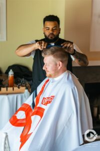 Wedding day on-site barber session at Tween Waters Island Resort in Captiva, FL.
