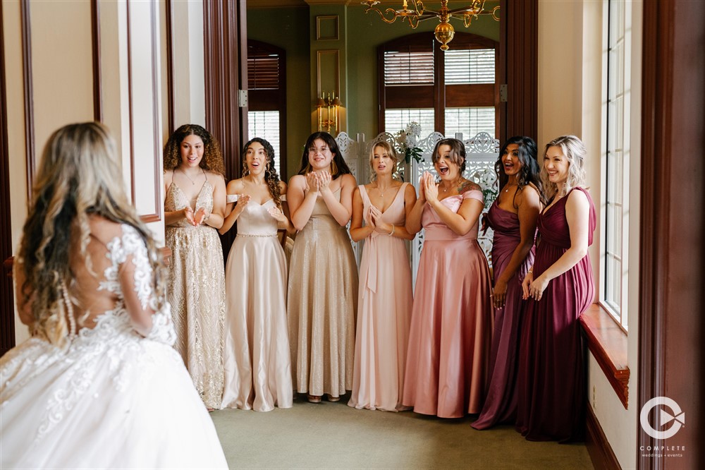 Bridesmaids first look in the Club at the Strands' bridal suite.